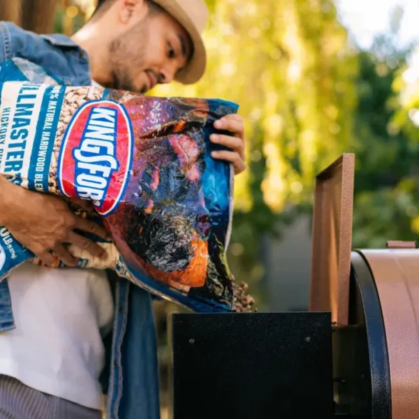 Man pouring pellets